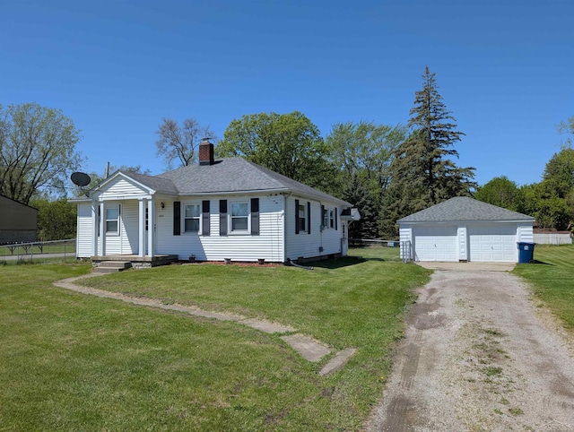 4515 N Michigan Rd, Carrollton, MI 48604 - view of front of home featuring a garage, an outbuilding, and a chimney