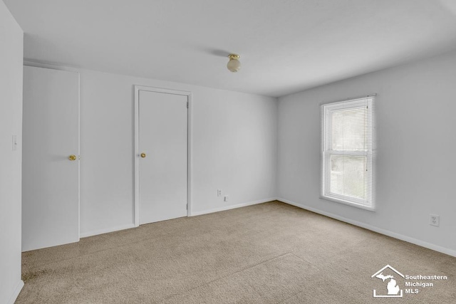 7316 Summerfield Rd, Lambertville, MI 48144 - unfurnished bedroom featuring carpet floors and baseboards