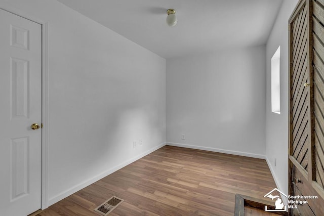 7316 Summerfield Rd, Lambertville, MI 48144 - spare room featuring wood finished floors and baseboards