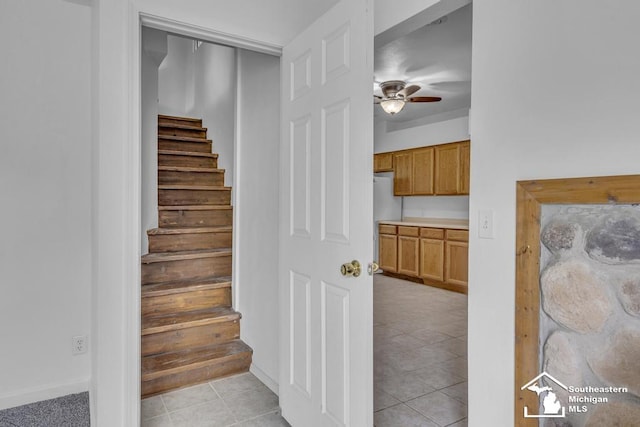 7316 Summerfield Rd, Lambertville, MI 48144 - stairway featuring ceiling fan, tile patterned flooring, and baseboards