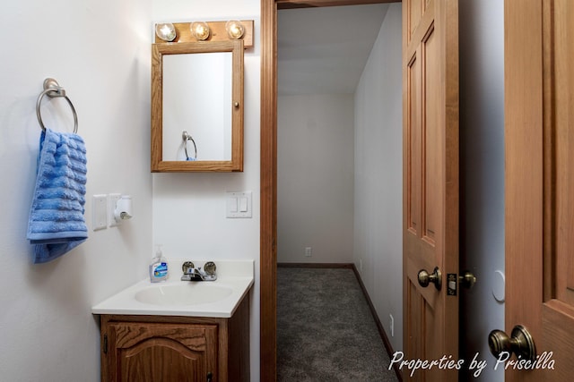 315 Hayes St NW, Comstock Park, MI 49321 - bathroom with vanity and baseboards