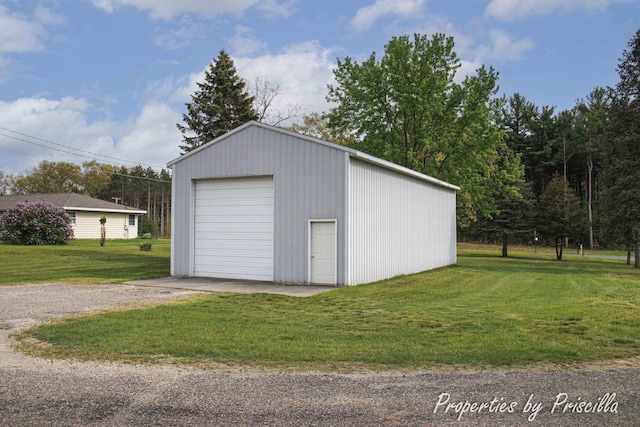 315 Hayes St NW, Comstock Park, MI 49321 - detached garage featuring gravel driveway