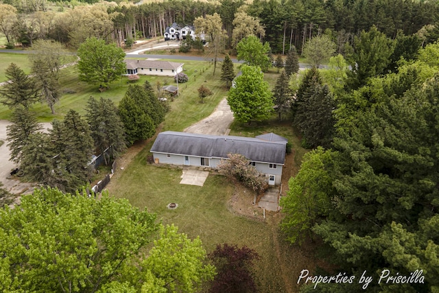 315 Hayes St NW, Comstock Park, MI 49321 - view of property location featuring a heavily wooded area
