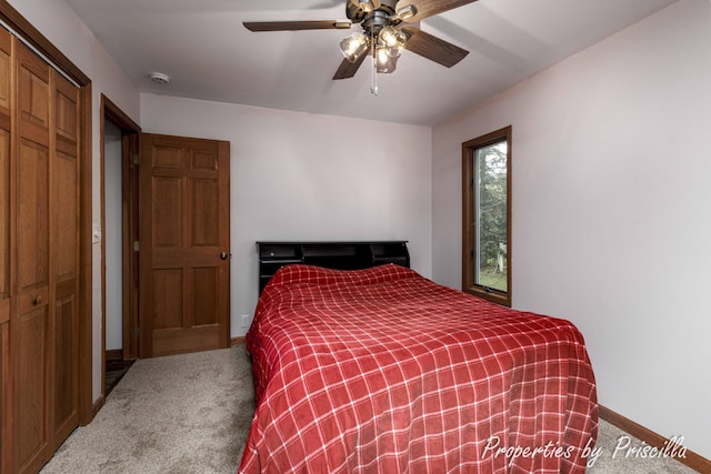 315 Hayes St NW, Comstock Park, MI 49321 - carpeted bedroom with a closet, baseboards, and a ceiling fan