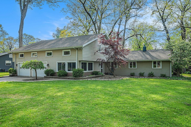 1514 Ferndale Blvd, Niles, MI 49120 - view of front of property featuring asphalt driveway, a garage, and a front lawn