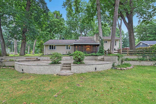 1514 Ferndale Blvd, Niles, MI 49120 - rear view of house with a sunroom