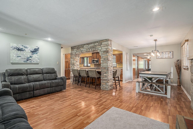 1514 Ferndale Blvd, Niles, MI 49120 - living area with light wood-style floors, baseboards, recessed lighting, and a textured ceiling
