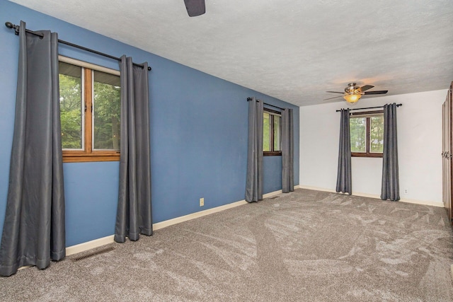 1514 Ferndale Blvd, Niles, MI 49120 - carpeted empty room featuring ceiling fan, a textured ceiling, and baseboards