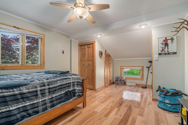1514 Ferndale Blvd, Niles, MI 49120 - bedroom with baseboards, light wood-style floors, crown molding, a ceiling fan, and lofted ceiling