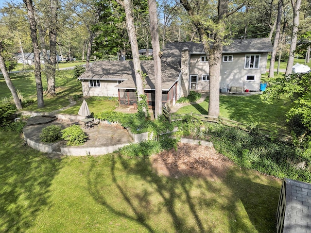 1514 Ferndale Blvd, Niles, MI 49120 - view of green lawn with a patio and view of wooded area