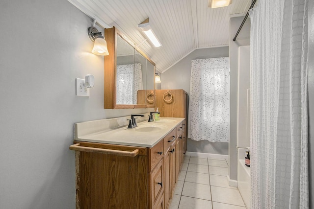 bathroom with lofted ceiling, tile patterned floors, vanity, and a shower with shower curtain