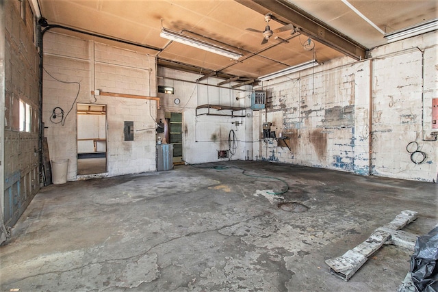 929 S Washington Ave, Ludington, MI 49431 - garage featuring concrete block wall