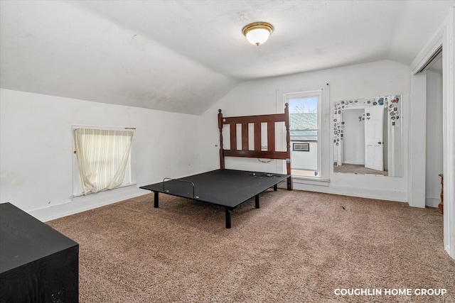 recreation room featuring lofted ceiling and carpet