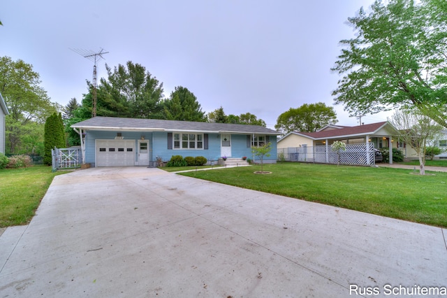 1572 Cornell Rd, Muskegon, MI 49441 - ranch-style home featuring a garage and driveway