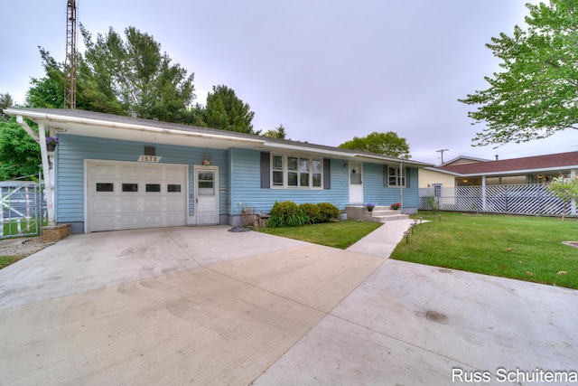 1572 Cornell Rd, Muskegon, MI 49441 - ranch-style house with an attached garage and concrete driveway