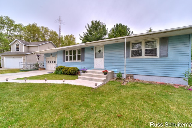 1572 Cornell Rd, Muskegon, MI 49441 - single story home with driveway, a garage, and a front yard