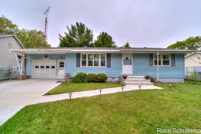 1572 Cornell Rd, Muskegon, MI 49441 - ranch-style home featuring a garage and driveway