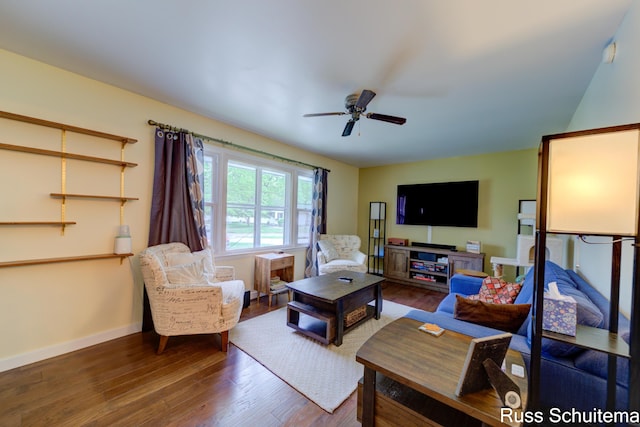 1572 Cornell Rd, Muskegon, MI 49441 - living area with wood finished floors, a ceiling fan, and baseboards