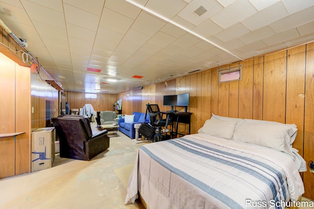 1572 Cornell Rd, Muskegon, MI 49441 - bedroom with concrete floors and wood walls