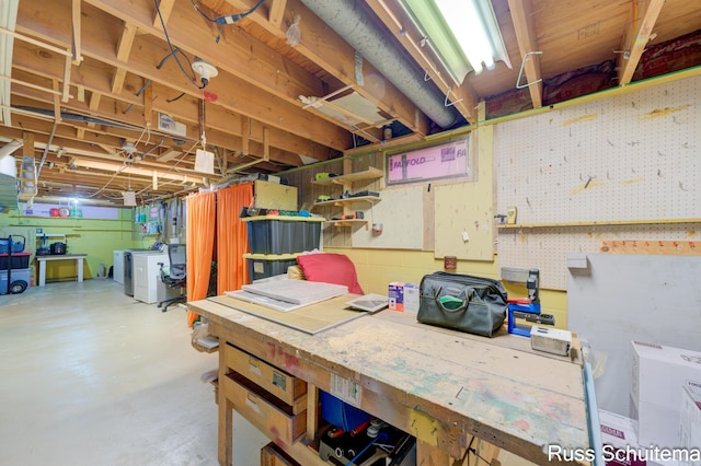 1572 Cornell Rd, Muskegon, MI 49441 - unfinished basement with a workshop area and independent washer and dryer