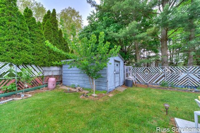 1572 Cornell Rd, Muskegon, MI 49441 - view of yard featuring a shed and an outdoor structure