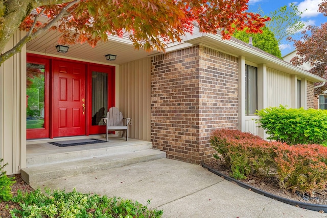836 Boutell Dr, Grand Blanc, MI 48439 - doorway to property with brick siding