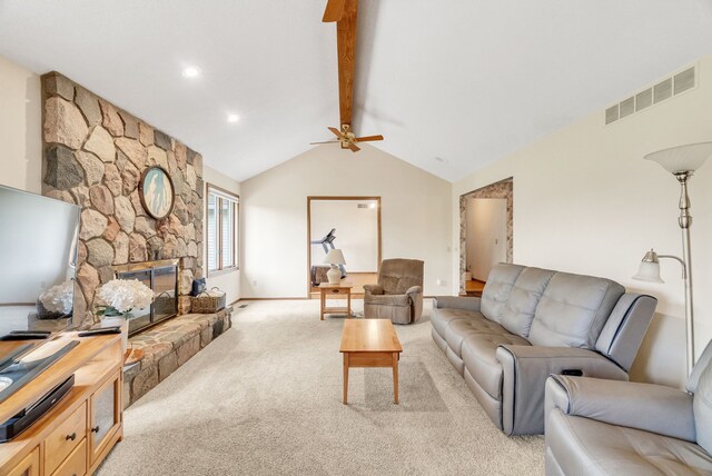 836 Boutell Dr, Grand Blanc, MI 48439 - living room featuring light colored carpet, ceiling fan, baseboards, and a stone fireplace
