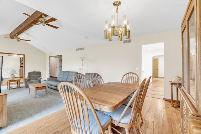 836 Boutell Dr, Grand Blanc, MI 48439 - dining area featuring light wood-style flooring, ceiling fan, and a chandelier