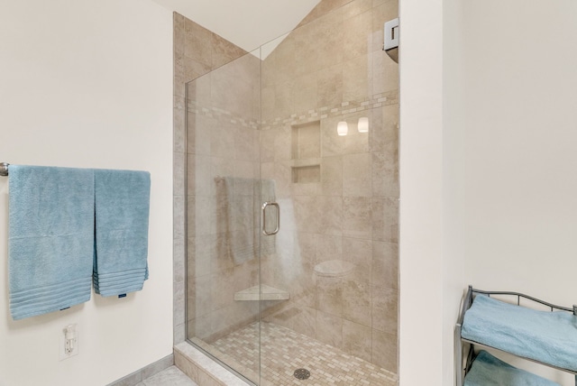 836 Boutell Dr, Grand Blanc, MI 48439 - full bathroom featuring a shower stall and baseboards