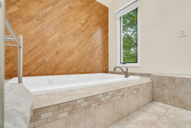 836 Boutell Dr, Grand Blanc, MI 48439 - full bathroom featuring a garden tub and tile patterned flooring