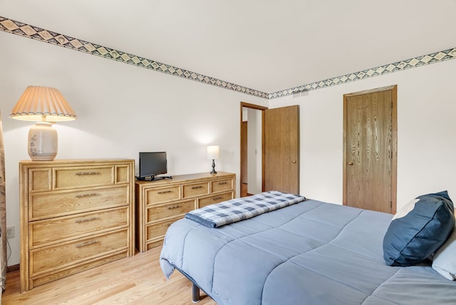 836 Boutell Dr, Grand Blanc, MI 48439 - bedroom featuring light wood finished floors