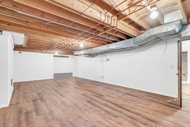 836 Boutell Dr, Grand Blanc, MI 48439 - finished basement with wood finished floors and baseboards