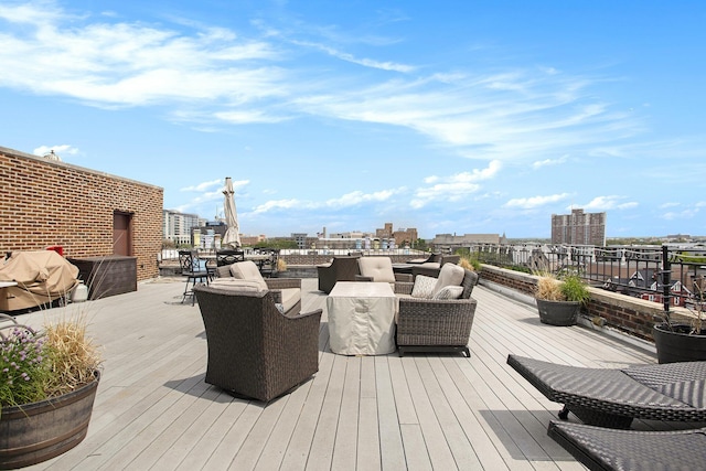 wooden terrace with a city view