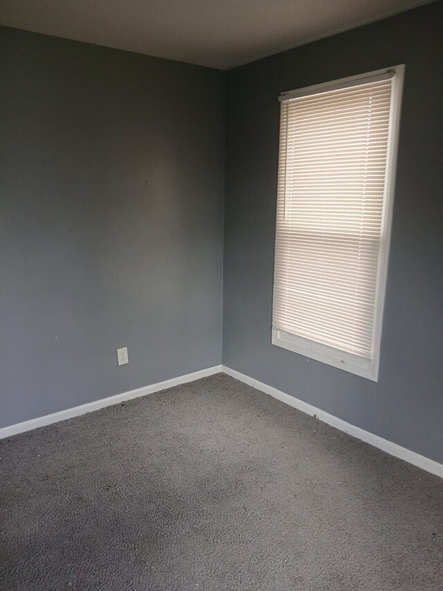 20000 Pelkey St, Detroit, MI 48205 - carpeted empty room featuring baseboards