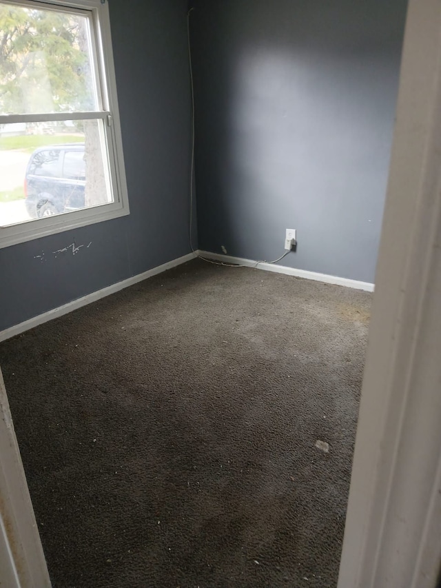 20000 Pelkey St, Detroit, MI 48205 - empty room featuring carpet flooring and baseboards
