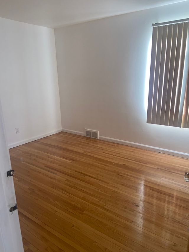 19121 Curtis St, Detroit, MI 48219 - spare room featuring wood-type flooring and baseboards