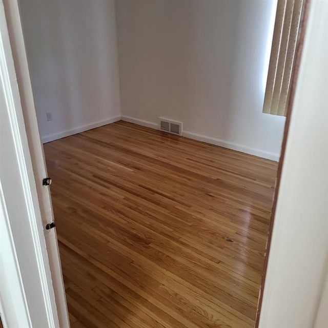 19121 Curtis St, Detroit, MI 48219 - unfurnished room featuring wood finished floors and baseboards