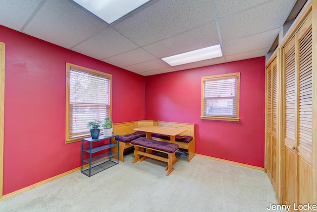 608 Porter Rd, Norton Shores, MI 49441 - carpeted home office featuring a paneled ceiling and baseboards