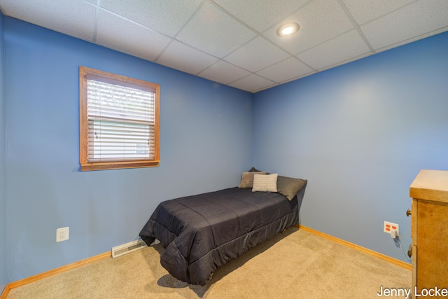 608 Porter Rd, Norton Shores, MI 49441 - carpeted bedroom with a paneled ceiling and baseboards