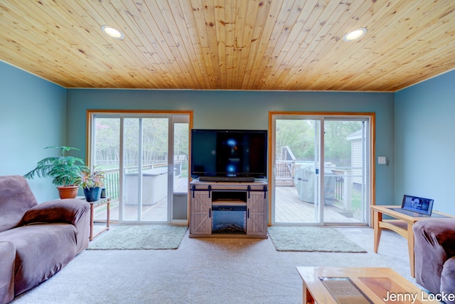 608 Porter Rd, Norton Shores, MI 49441 - carpeted living room featuring recessed lighting, wooden ceiling, and a fireplace