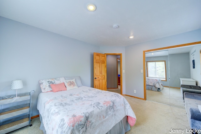 608 Porter Rd, Norton Shores, MI 49441 - bedroom featuring carpet floors, baseboards, a closet, and recessed lighting