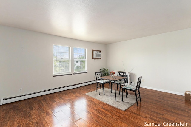 399 Stratford Way, Holland, MI 49423 - dining space featuring baseboard heating, wood finished floors, a wall mounted AC, and baseboards