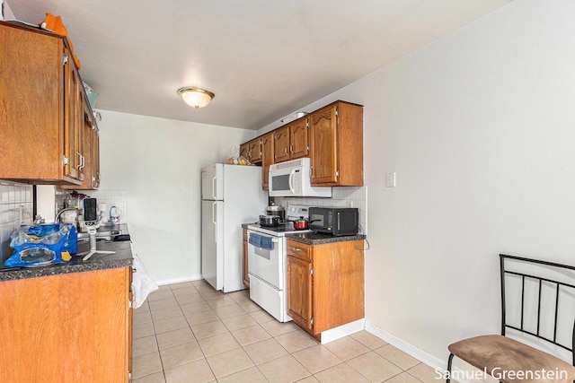 399 Stratford Way, Holland, MI 49423 - kitchen featuring white appliances, backsplash, light tile patterned flooring, and brown cabinets