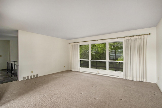 10706 Portage Rd, Portage, MI 49002 - carpeted empty room with baseboard heating
