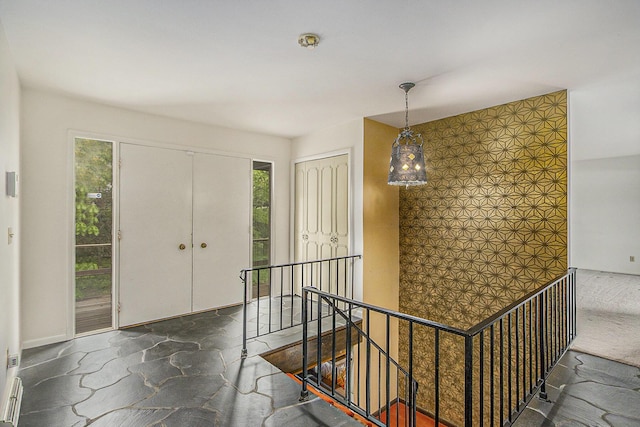 10706 Portage Rd, Portage, MI 49002 - entrance foyer with stone flooring and plenty of natural light