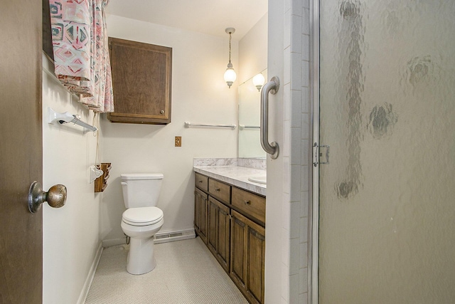 10706 Portage Rd, Portage, MI 49002 - full bath featuring a stall shower, vanity, toilet, and baseboards