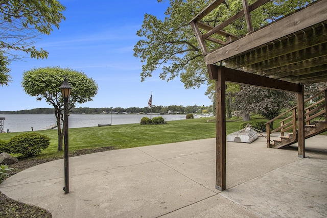 10706 Portage Rd, Portage, MI 49002 - view of patio / terrace with stairway and a water view