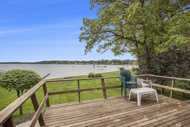 10706 Portage Rd, Portage, MI 49002 - wooden terrace with a water view and a lawn