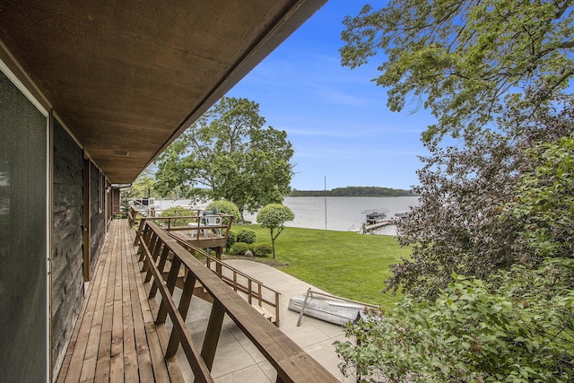 10706 Portage Rd, Portage, MI 49002 - wooden terrace featuring a water view and a yard