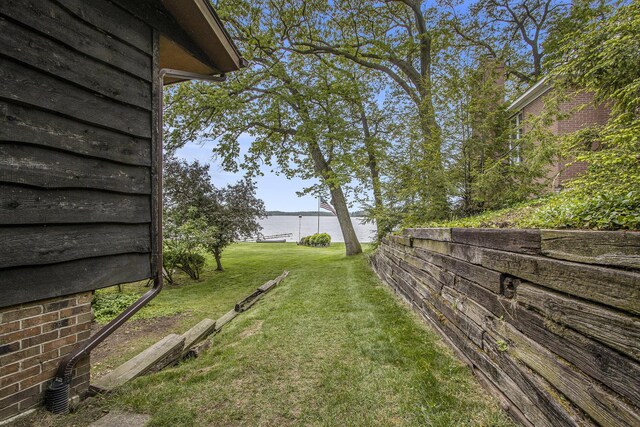 10706 Portage Rd, Portage, MI 49002 - view of green lawn with a water view